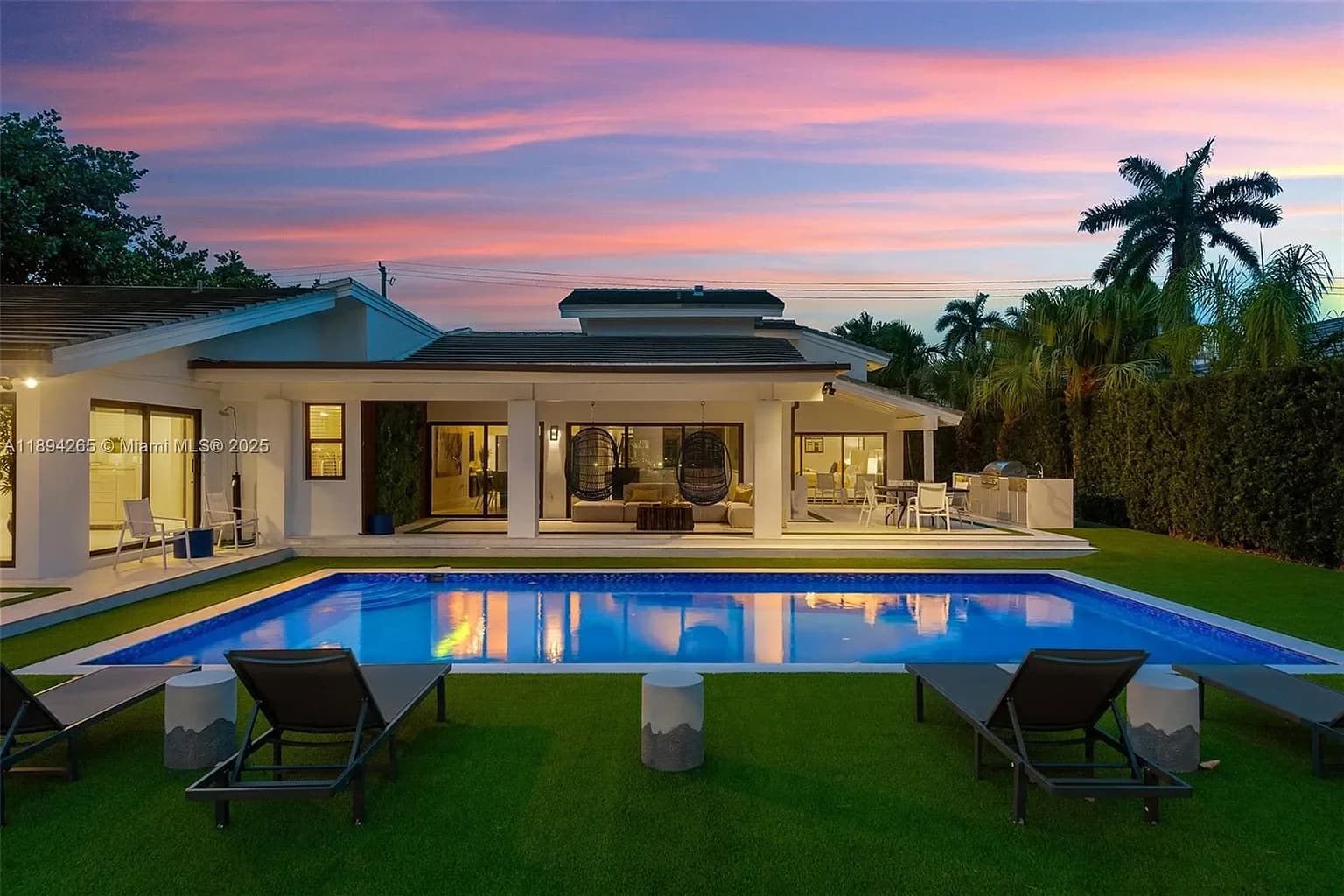Pool and backyard at Villa Larsa