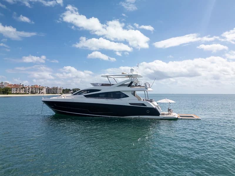 80 Sunseeker SMU on a waterway with its flybridge visible
