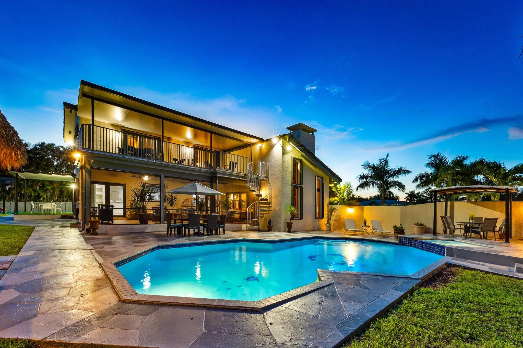 Pool and illuminated exterior at Cherry Royale