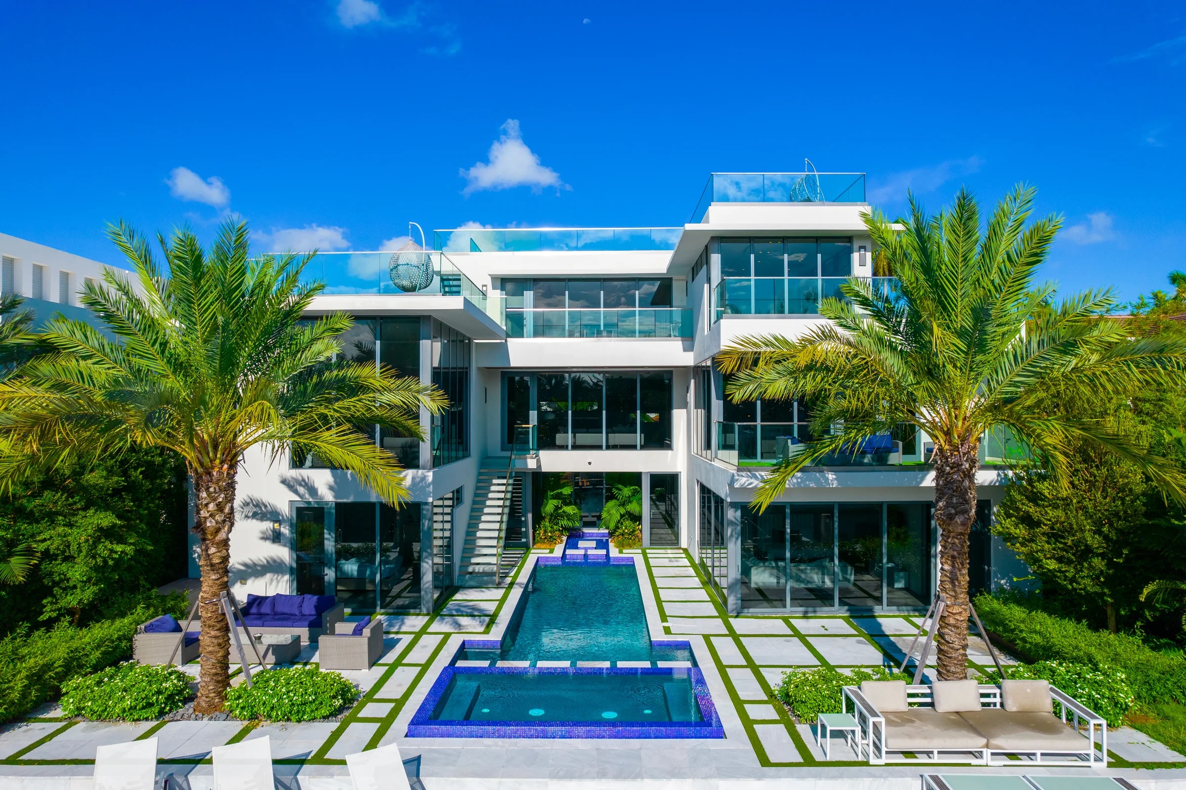 Waterfront exterior and pool at Park Place Mansion