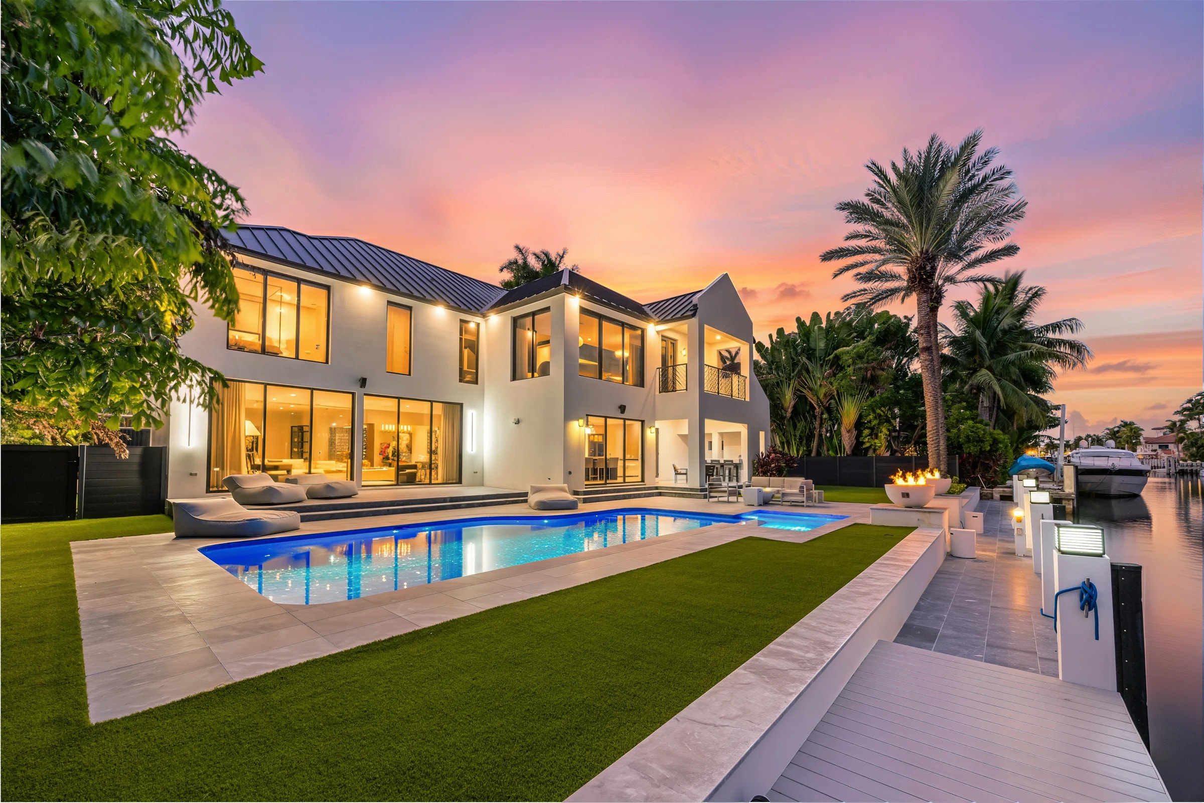Waterfront lawn and pool at San Marco Bleu