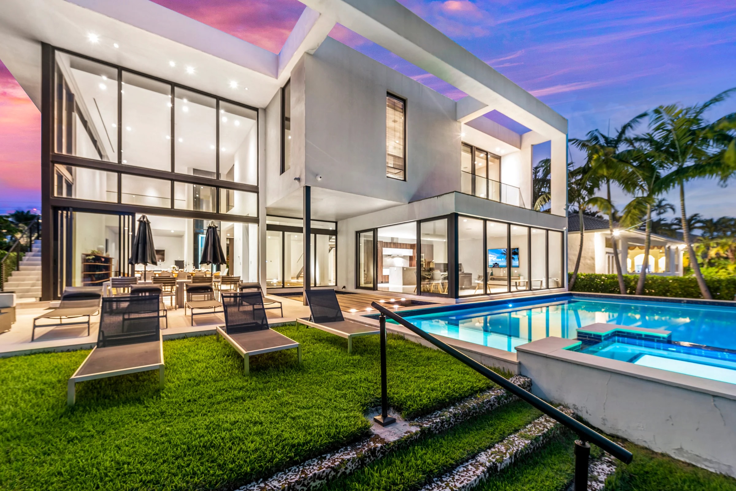 Pool and waterfront terrace at Sunset Mansion