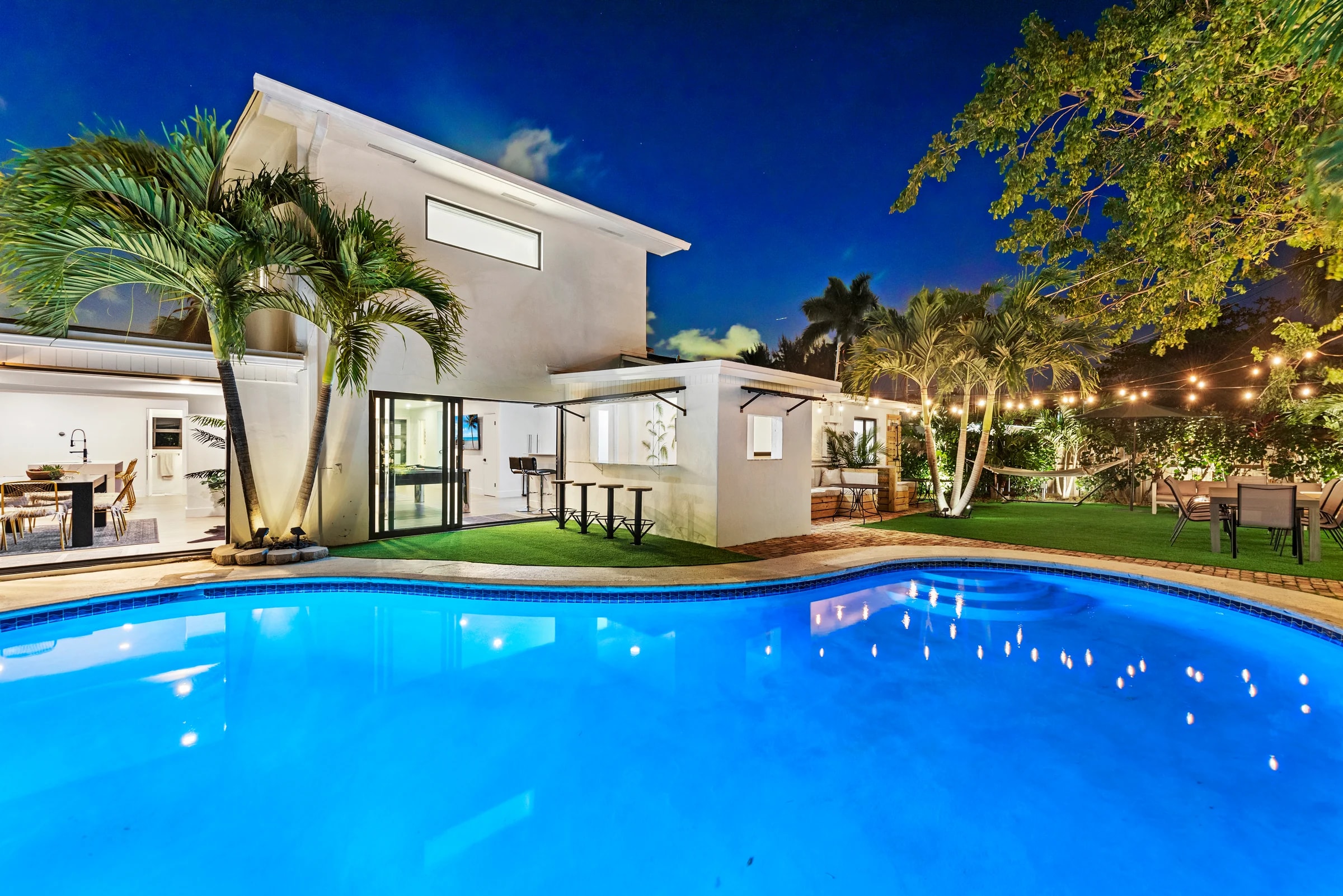 Pool and outdoor lounge areas at Villa Azur