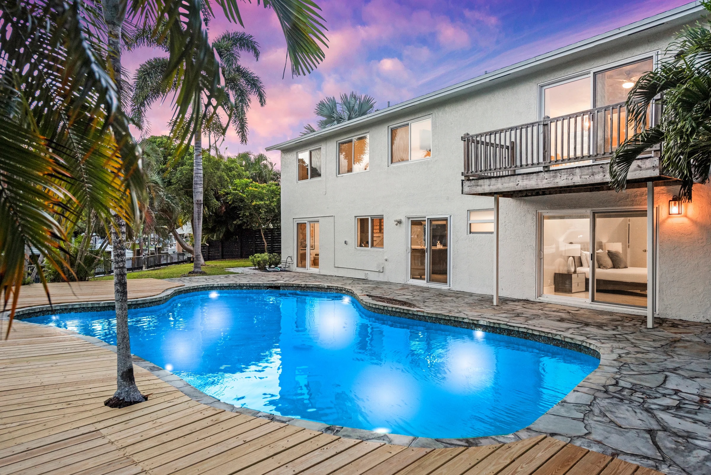 Pool and outdoor seating at Villa Calypso