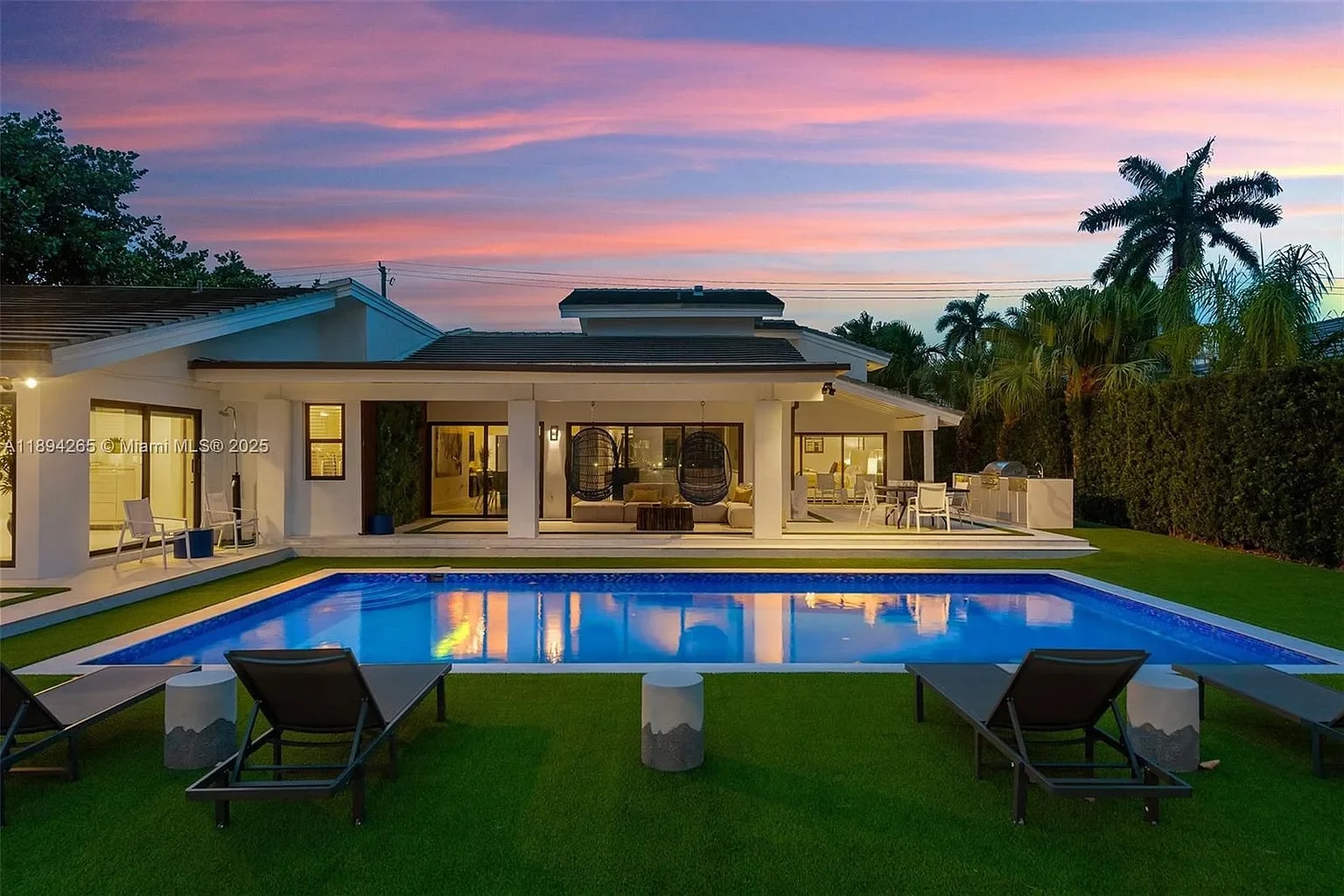 Pool and backyard at Villa Larsa