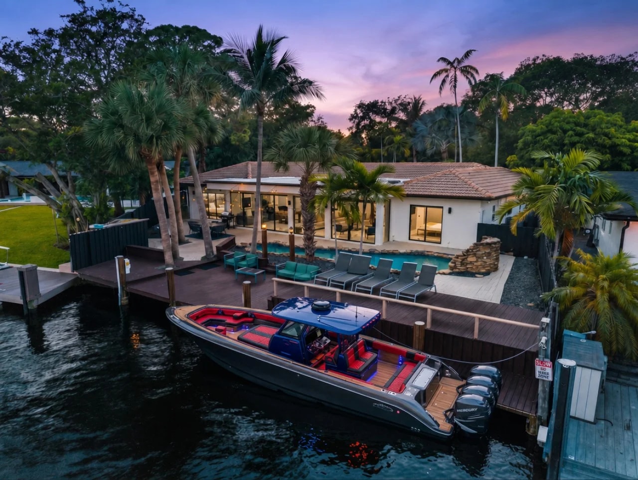 Waterfront dock and pool at Villa Marbella