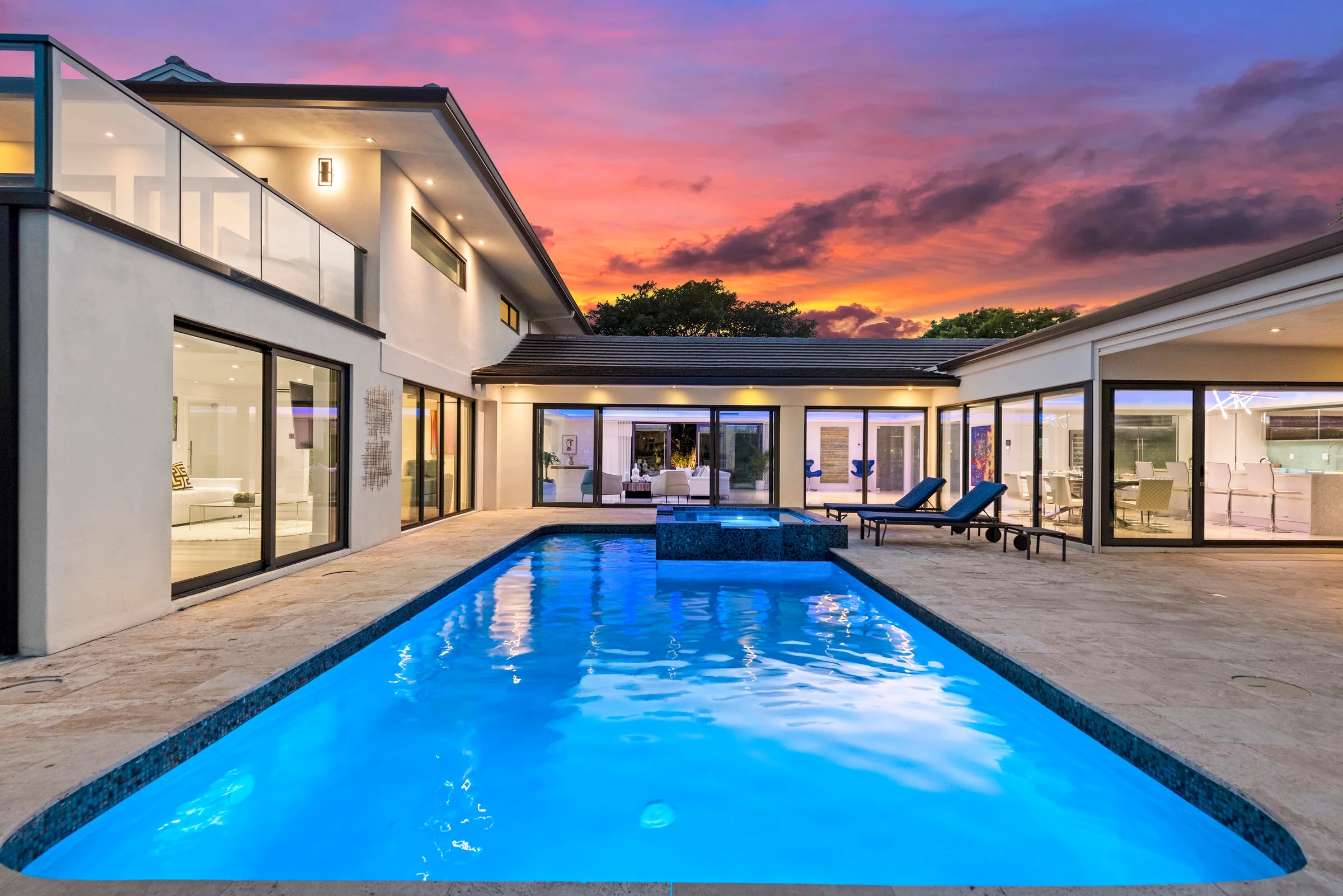 Pool and waterfront terrace at Villa Paraiso