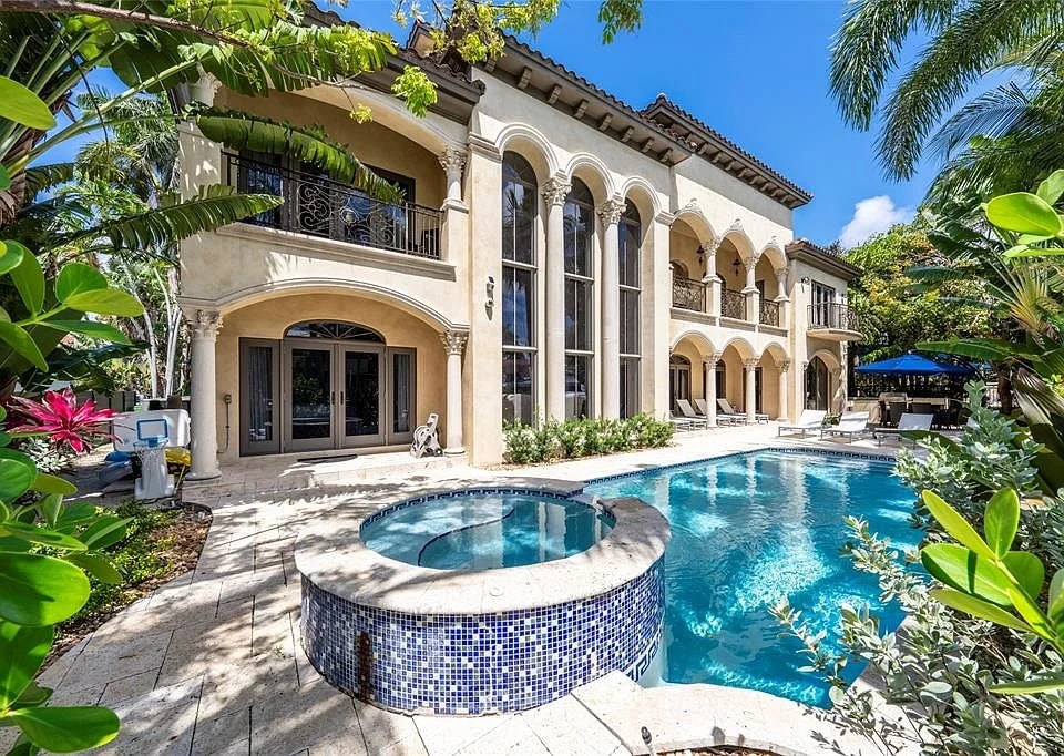 Pool and arched exterior at Villa Santiago
