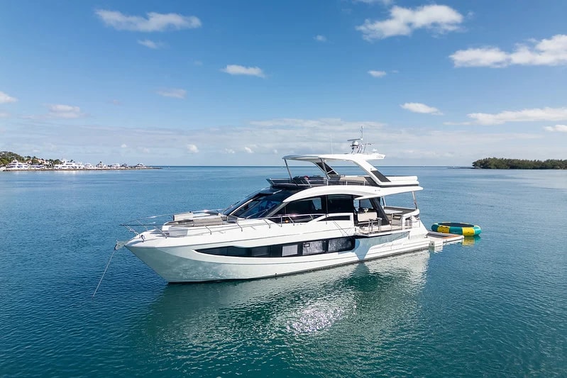 68 Galeon Seven Seas on calm water with its side terrace open