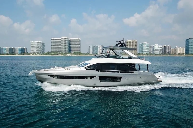 70 Azimut underway with its flybridge and bow seating visible